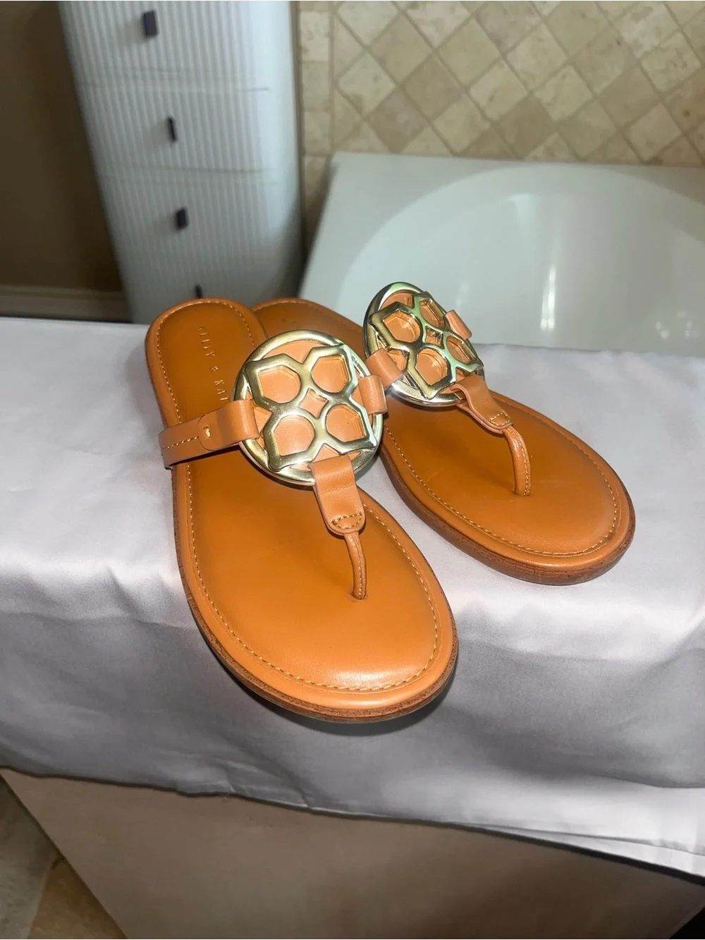 Kelly & Katie Tan Leather T-Strap Sandals with Gold Medallion
